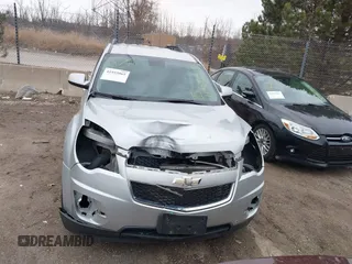 2015 Chevrolet Equinox LT z VIN 2GNFLFEK5F6341898, wystawiony jako IAAI lot #41953065 z przebiegiem 148 017 mil mil oraz . Historia ofert i sprzedaży dostępna na DreamBid. Obrazek 13.
