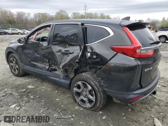 2018 Honda CR-V EX with VIN 2HKRW2H57JH694949, listed as a Copart auction lot 51324315 with 94,470 mi miles and Salvage Title. Bid and sale history available at DreamBid. Image 2.