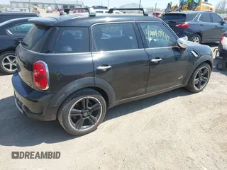2011 MINI Countryman S with VIN WMWZC5C50BWL53922, listed as a IAAI auction lot 42069410 with 66,797 mi miles and . Bid and sale history available at DreamBid. Image 4.