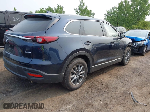 2023 Mazda CX-9 Touring with VIN JM3TCBCY6P0642838, listed as a IAAI auction lot 42407123 with 15,181 mi miles and . Bid and sale history available at DreamBid. Image 4.