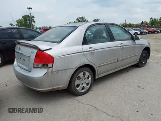 2009 Kia Spectra EX with VIN KNAFE221995613874, listed as a IAAI auction lot 42467453 with 104,158 mi miles and . Bid and sale history available at DreamBid. Image 4.