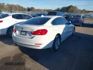 2016 BMW 4 Series 428i xDrive with VIN WBA4C9C54GG139275, listed as a IAAI auction lot 40828786 with 128,124 mi miles and . Bid and sale history available at carsss.com. Image 4.
