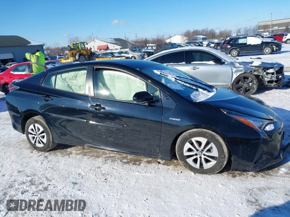 2016 Toyota Prius Four z VIN JTDKARFU3G3525194, wystawiony jako IAAI lot #41231789 z przebiegiem 72 654 mil mil oraz . Historia ofert i sprzedaży dostępna na DreamBid. Obrazek 13.