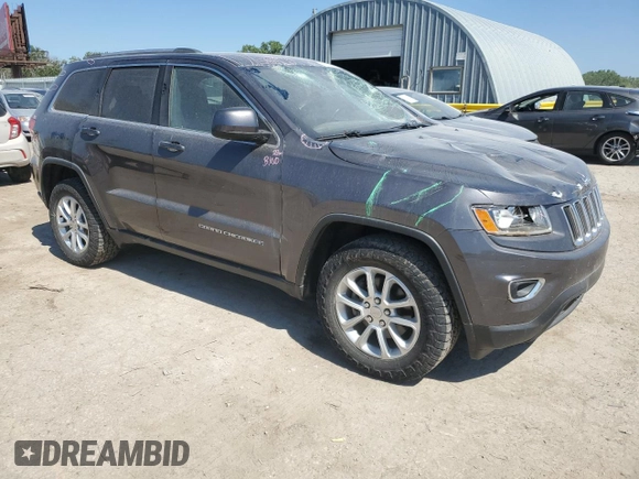 2016 Jeep Grand Cherokee Laredo with VIN 1C4RJFAG2GC328841, listed as a Copart auction lot 63553435 with 100,472 mi miles and Salvage title. Bid and sale history available at DreamBid. Image 4.