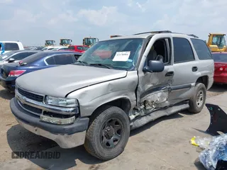 2004 Chevrolet Tahoe LS z VIN 1GNEC13T44R180732, wystawiony jako IAAI lot #42170904 z przebiegiem Nie podano mil oraz . Historia ofert i sprzedaży dostępna na DreamBid. Obrazek 6.