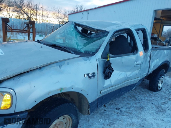 1999 Ford F-150 XL with VIN 1FTRX18LXXNA44916, listed as a IAAI auction lot 41322276 with 1 mi miles. Bid and sale history available at carsss.com. Image 6.