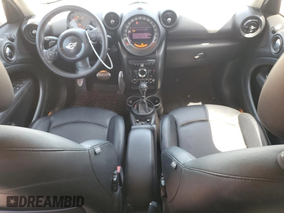 2016 MINI Countryman S with VIN WMWZC3C58GWT09694, listed as a Copart auction lot 57113235 with 126,082 mi miles and Salvage title. Bid and sale history available at DreamBid. Image 8.