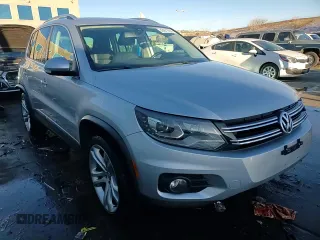 2012 Volkswagen Tiguan LE z VIN WVGAV7AX6CW594438, wystawiony jako Copart lot #42971665 z przebiegiem 120 532 mil mil oraz Szkoda całkowita • Salvage title. Historia ofert i sprzedaży dostępna na DreamBid. Obrazek 14.