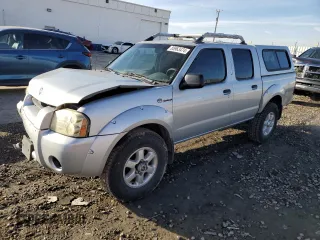 2003 Nissan Frontier SVE with VIN 1N6MD27Y73C412302, listed as a Copart auction lot 85963474 with 175,356 mi miles and Salvage title. Bid and sale history available at DreamBid. Image 1.