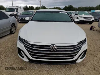 2023 Volkswagen Arteon SEL R-Line z VIN WVWSR7ANXPE013112, wystawiony jako Copart lot #74192954 z przebiegiem Nie podano mil oraz Szkoda całkowita • Salvage title. Historia ofert i sprzedaży dostępna na DreamBid. Obrazek 5.