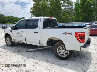 2023 Ford F-150 XL with VIN 1FTFW1E85PKG17275, listed as a Copart auction lot 57497155 with 34,379 mi miles and Salvage title. Bid and sale history available at DreamBid. Image 2.