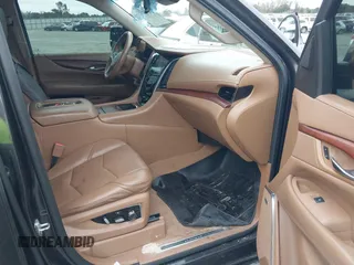 2016 Cadillac Escalade Platinum z VIN 1GYS4DKJ1GR363238, wystawiony jako IAAI lot #40974636 z przebiegiem 128 296 mil mil oraz . Historia ofert i sprzedaży dostępna na DreamBid. Obrazek 5.