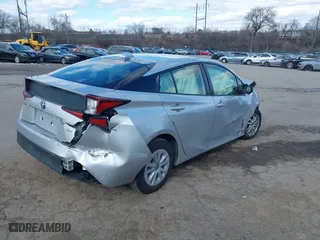 2022 Toyota Prius L Eco with VIN JTDKAMFU7N3176041, listed as a IAAI auction lot 41562977 with 61,964 mi miles. Bid and sale history available at carsss.com. Image 4.