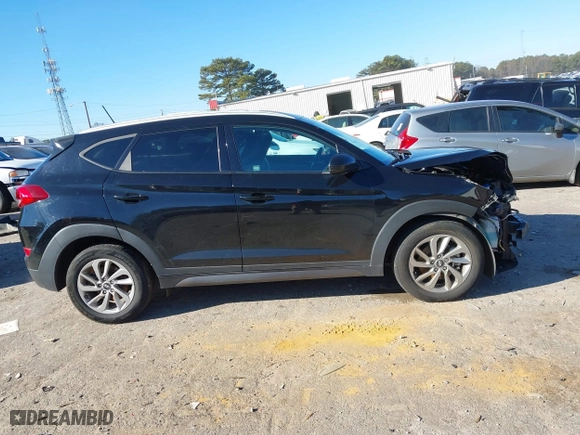 2016 Hyundai Tucson SE with VIN KM8J3CA4XGU039773, listed as a IAAI auction lot 41295718 with 161,209 mi miles. Bid and sale history available at carsss.com. Image 13.