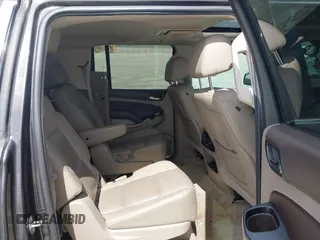 2015 Chevrolet Suburban LTZ with VIN 1GNSCKKC9FR500933, listed as a IAAI auction lot 41830980 with 169,217 mi miles and . Bid and sale history available at DreamBid. Image 8.