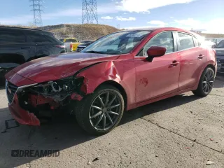 2014 Mazda 3 S Touring with VIN JM1BM1L30E1190845, listed as a Copart auction lot 85344714 with 123,775 mi miles and Salvage Title. Bid and sale history available at DreamBid. Image 1.