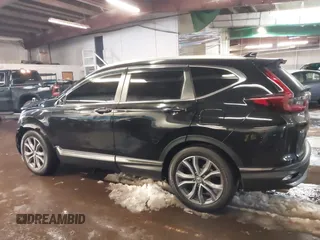 2020 Honda CR-V Touring with VIN 2HKRW2H94LH663650, listed as a IAAI auction lot 41570549 with 29,571 mi miles and . Bid and sale history available at DreamBid. Image 14.