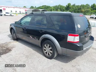 2008 Ford Taurus X SEL z VIN 1FMDK02W18GA42379, wystawiony jako IAAI lot #42669734 z przebiegiem 255 635 mil mil oraz . Historia ofert i sprzedaży dostępna na DreamBid. Obrazek 3.