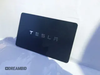 2022 Tesla Model X with VIN 7SAXCAE59NF360301, listed as a IAAI auction lot 41945059 with Not Provided miles and . Bid and sale history available at DreamBid. Image 11.