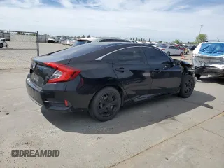 2018 Honda Civic LX with VIN 2HGFC2F54JH523052, listed as a Copart auction lot 52910375 with 147,550 mi miles and Salvage Title. Bid and sale history available at carsss.com. Image 3.