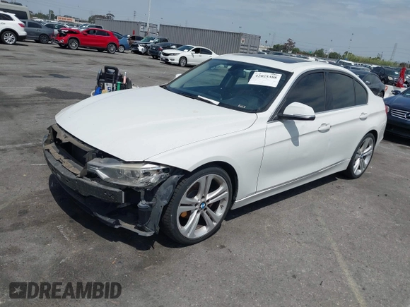 2013 BMW 3 Series 328i with VIN WBA3C1C5XDF437585, listed as a IAAI auction lot 42025388 with 101,963 mi miles. Bid and sale history available at carsss.com. Image 2.