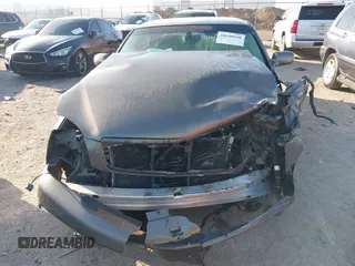 2002 Cadillac DeVille DHS z VIN 1G6KE57Y52U283531, wystawiony jako IAAI lot #41640930 z przebiegiem 94 435 mil mil oraz . Historia ofert i sprzedaży dostępna na DreamBid. Obrazek 6.