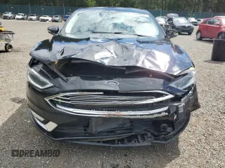 2017 Ford Fusion SE z VIN 3FA6P0H96HR150012, wystawiony jako Copart lot #56789925 z przebiegiem 167 772 mil mil oraz Szkoda całkowita • Salvage title. Historia ofert i sprzedaży dostępna na DreamBid. Obrazek 5.