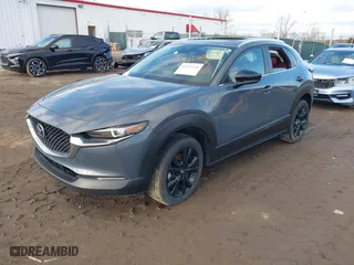 2022 Mazda CX-30 2.5 S Preferred Package with VIN 3MVDMBCL3NM422497, listed as a IAAI auction lot 41236220 with 57,752 mi miles. Bid and sale history available at carsss.com. Image 2.