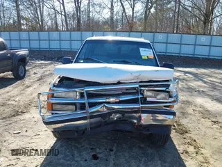 1996 Chevrolet Suburban with VIN 3GNFK16RXTG135350, listed as a IAAI auction lot 41482918 with 157,971 mi miles. Bid and sale history available at carsss.com. Image 12.