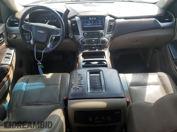 2015 Chevrolet Tahoe LTZ with VIN 1GNSCCKC2FR693500, listed as a Copart auction lot 60225195 with 206,210 mi miles and Salvage title. Bid and sale history available at DreamBid. Image 8.