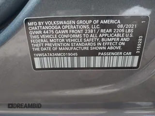 2021 Volkswagen Passat SE with VIN 1VWSA7A34MC019045, listed as a IAAI auction lot 42164157 with 78,436 mi miles and . Bid and sale history available at DreamBid. Image 9.