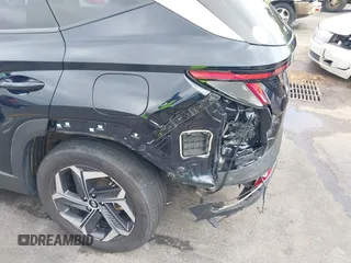 2022 Hyundai Tucson SEL Convenience with VIN KM8JFCA10NU049450, listed as a IAAI auction lot 41915300 with 23,584 mi miles and . Bid and sale history available at carsss.com. Image 6.
