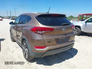 2016 Hyundai Tucson Sport with VIN KM8J33A29GU054909, listed as a IAAI auction lot 41835688 with 90,751 mi miles. Bid and sale history available at carsss.com. Image 3.