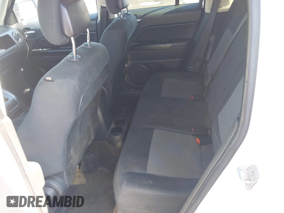 2014 Jeep Patriot Latitude with VIN 1C4NJPFA8ED550221, listed as a IAAI auction lot 41919419 with 185,386 mi miles and . Bid and sale history available at carsss.com. Image 8.