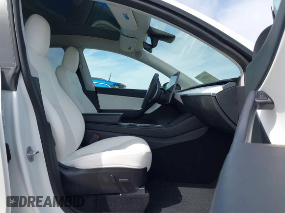 2021 Tesla Model Y Performance z VIN 5YJYGDEF7MF277769, wystawiony jako IAAI lot #42025157 z przebiegiem 28 522 mil mil oraz . Historia ofert i sprzedaży dostępna na DreamBid. Obrazek 5.