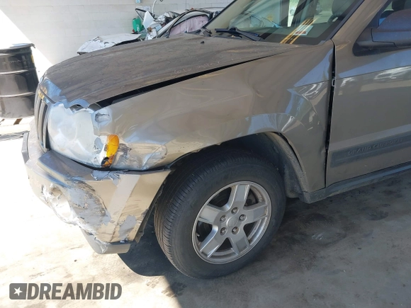 2005 Jeep Grand Cherokee Laredo with VIN 1J4GR48K05C619957, listed as a IAAI auction lot 42626093 with 279,017 mi miles and . Bid and sale history available at DreamBid. Image 6.
