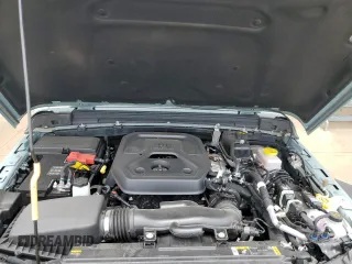2023 Jeep Wrangler Sport with VIN 1C4HJXDN0PW643485, listed as a Copart auction lot 59783564 with 14,001 mi miles and Salvage Title. Bid and sale history available at DreamBid. Image 12.
