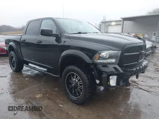 2014 Ram 1500 Express with VIN 1C6RR7KTXES152044, listed as a IAAI auction lot 41116340 with 141,136 mi miles. Bid and sale history available at carsss.com. Image 1.