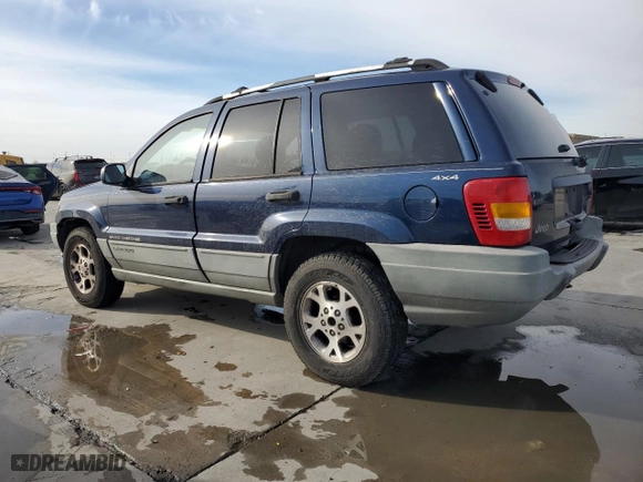 1999 Jeep Grand Cherokee Laredo with VIN 1J4GW58S0XC653687, listed as a Copart auction lot 81166844 with 252,330 mi miles and Salvage Title. Bid and sale history available at carsss.com. Image 2.