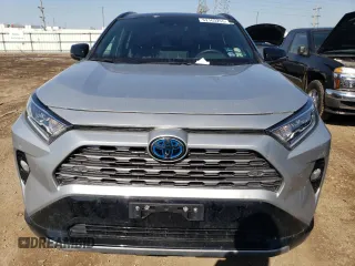 2021 Toyota RAV4 Hybrid XSE with VIN 2T3E6RFV9MW013200, listed as a Copart auction lot 52163255 with 58,336 mi miles and Salvage title. Bid and sale history available at DreamBid. Image 5.