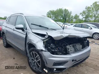 2021 Volkswagen Tiguan SE z VIN 3VV2B7AX7MM005224, wystawiony jako IAAI lot #42337356 z przebiegiem 84 652 mil mil oraz . Historia ofert i sprzedaży dostępna na DreamBid. Obrazek 1.