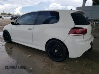 2012 Volkswagen Golf w/Sunroof & Navi с VIN WVWRF7AJ7CW266591, выставлен на аукционе Copart как лот 74010074 с пробегом 192 664 миль миль и Списание • Salvage title. История ставок и продаж доступна на DreamBid. Изображение 2.