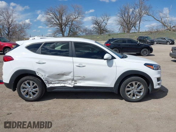 2019 Hyundai Tucson SE with VIN KM8J2CA43KU870933, listed as a IAAI auction lot 41972884 with 53,029 mi miles. Bid and sale history available at carsss.com. Image 14.