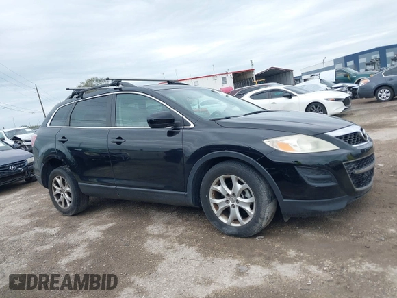 2011 Mazda CX-9 Touring with VIN JM3TB2CA3B0319068, listed as a IAAI auction lot 41731470 with 111,273 mi miles and . Bid and sale history available at DreamBid. Image 13.