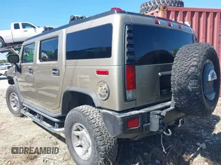 2005 Hummer H2 SUV with VIN 5GRGN23U85H129007, listed as a IAAI auction lot 41625417 with 102,389 mi miles. Bid and sale history available at carsss.com. Image 3.