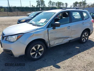 2017 Subaru Forester with VIN JF2SJABC1HH577623, listed as a IAAI auction lot 42061596 with 67,900 mi miles. Bid and sale history available at carsss.com. Image 6.