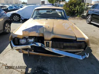 1967 Mercury Cougar z VIN 7F93A600409, wystawiony jako Copart lot #71630684 z przebiegiem 64 547 mil mil oraz Szkoda całkowita • Salvage title. Historia ofert i sprzedaży dostępna na DreamBid. Obrazek 5.