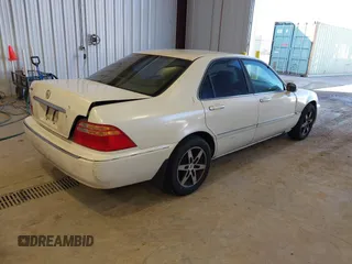 1999 Acura RL with VIN JH4KA9661XC007276, listed as a IAAI auction lot 41686607 with 249,992 mi miles. Bid and sale history available at carsss.com. Image 4.