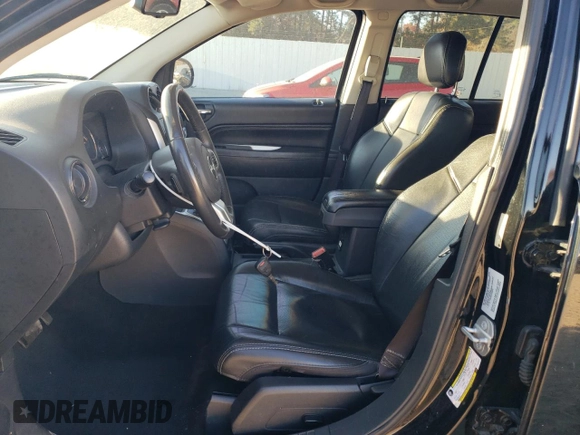 2015 Jeep Compass High Altitude Edition with VIN 1C4NJDEB4FD216777, listed as a Copart auction lot 79407354 with 164,501 mi miles and Salvage Title. Bid and sale history available at carsss.com. Image 7.