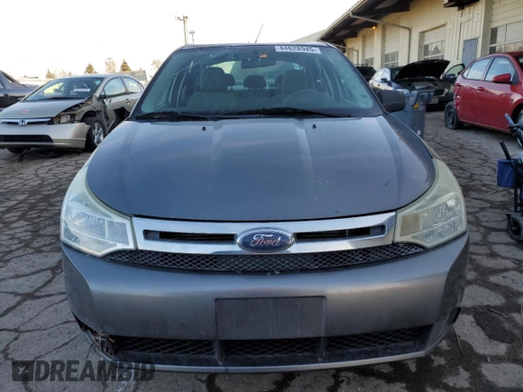 2009 Ford Focus S with VIN 1FAHP34N79W212190, listed as a Copart auction lot 44628945 with 129,568 mi miles and Salvage Title. Bid and sale history available at carsss.com. Image 5.